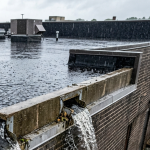 high rainfall volume on a flat commercial roof