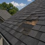 closeup view of damaged roof shingles