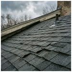 damaged shingle roof on a house in Cincinnati